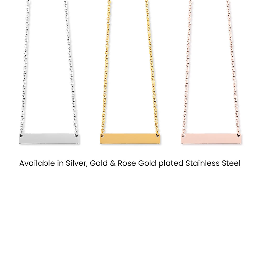 A personalised necklace in the shape of a horizontal bar. Text in the centre of the bar. Gold Silver or Rose Gold plated.