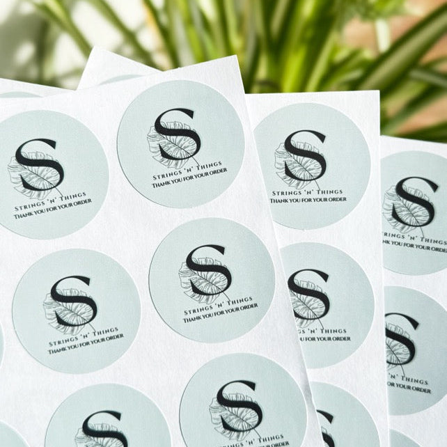 Branded logo stickers applied to small business packaging and parcels