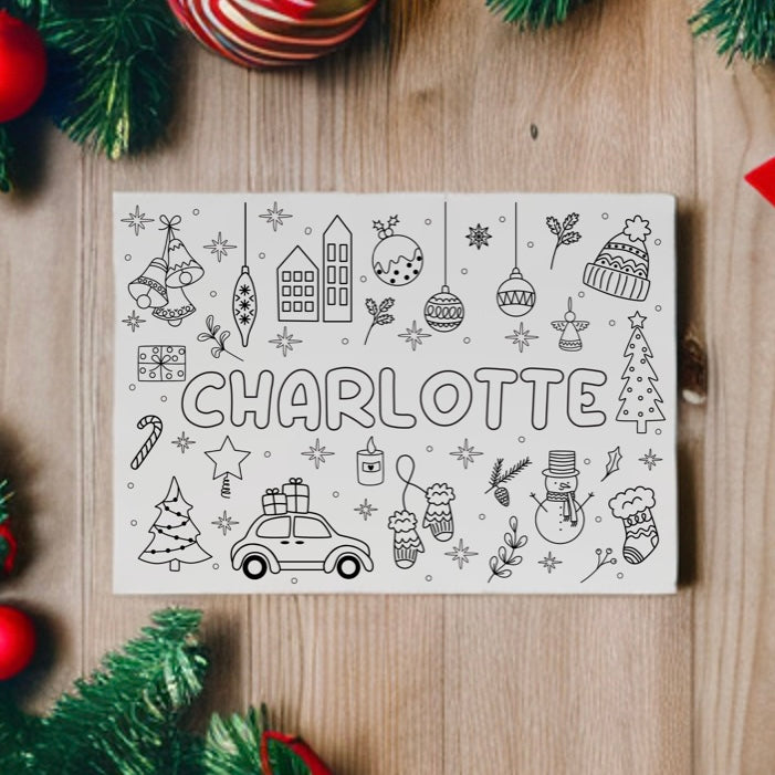 Christmas colouring placemat personalised with the name Charlotte among fir branches