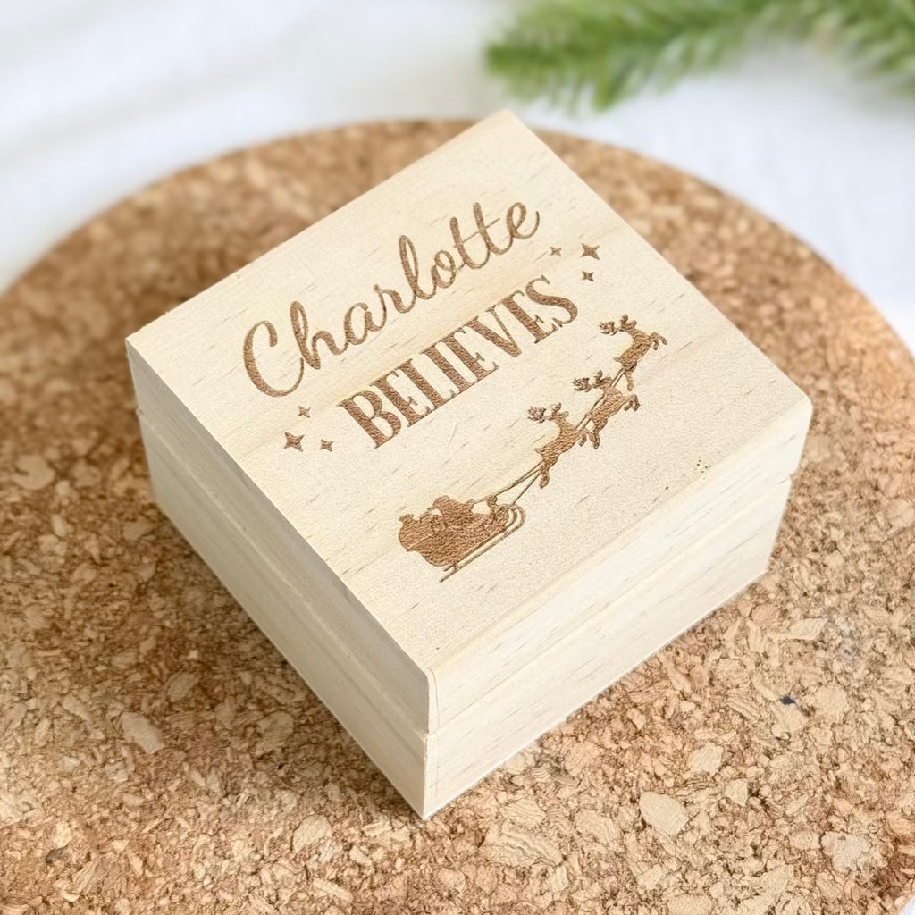 Christmas wooden box ‘Charlotte Believes’ with reindeer design on cork surface