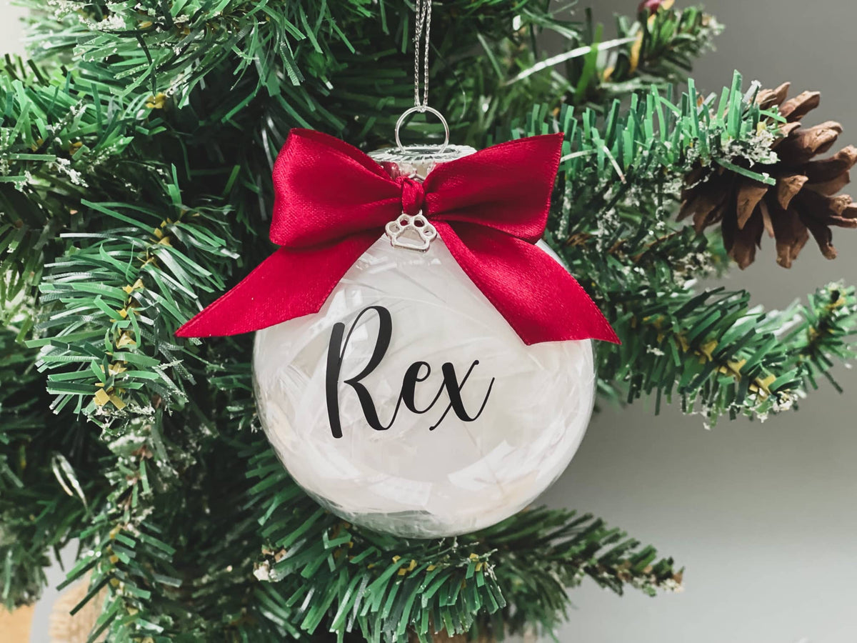 Rex pet memorial bauble hanging on a Christmas tree
