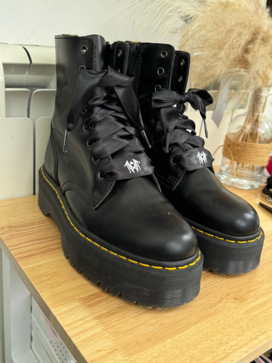 Black satin ribbon shoelaces featuring white Sleep Token logos, neatly tied and displayed for footwear customisation.
