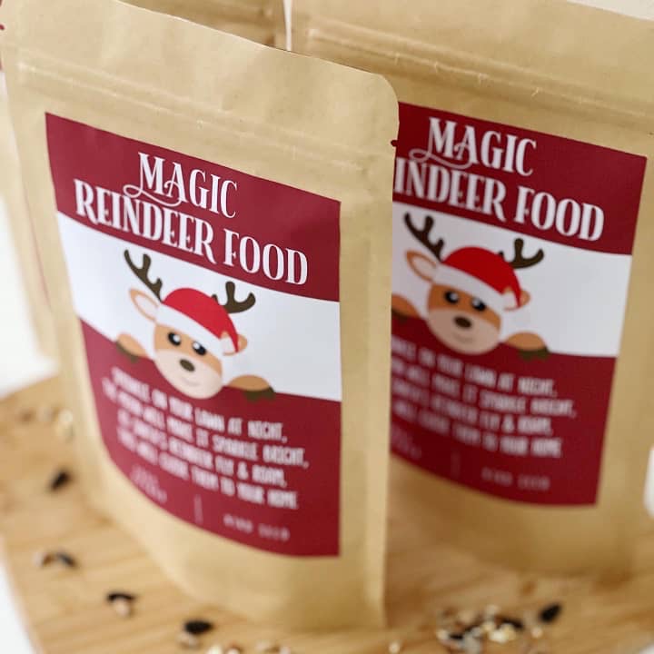 Two Magic Reindeer Food pouches with a red cartoon reindeer label