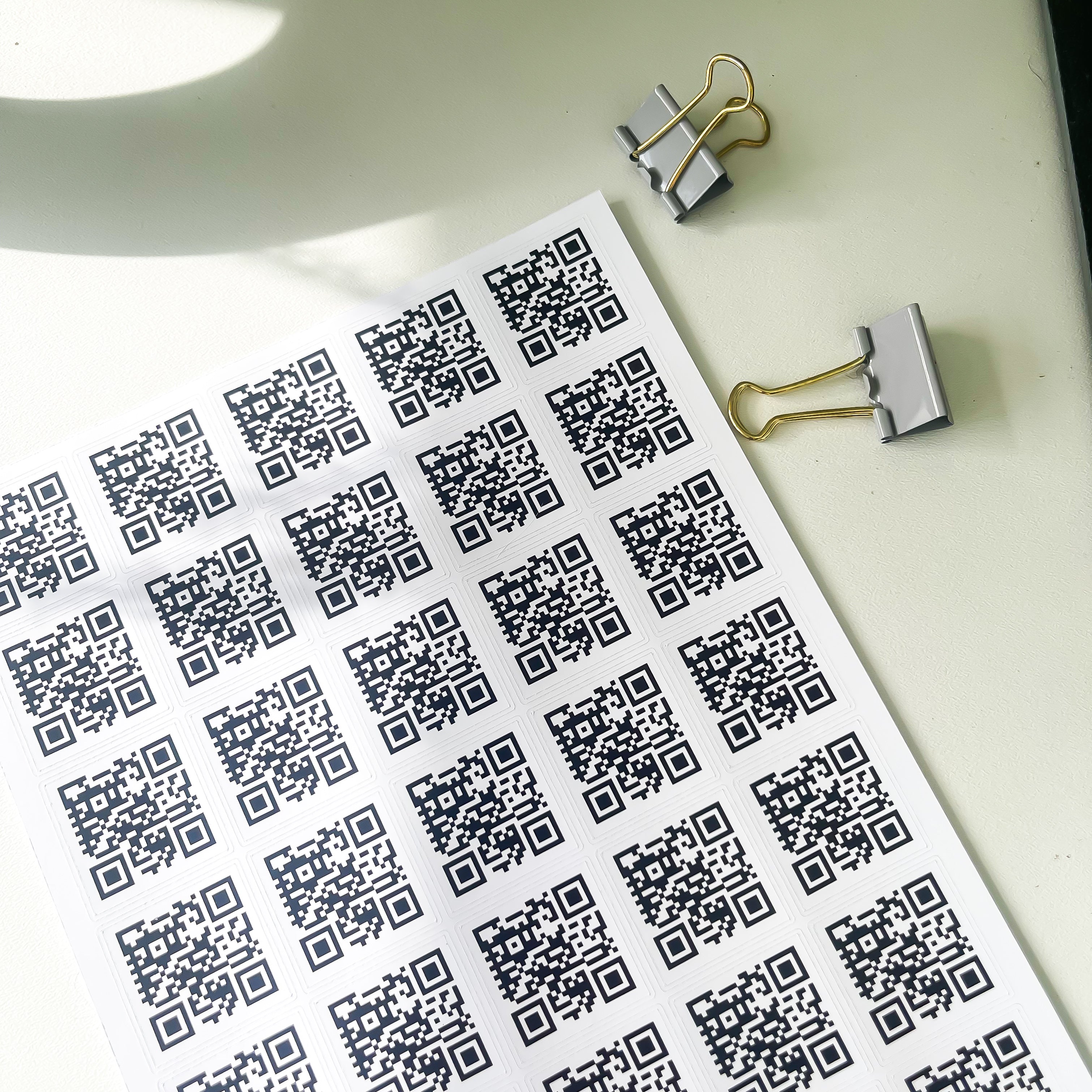 QR code sticker sheet with high-resolution scannable codes for packaging and reviews