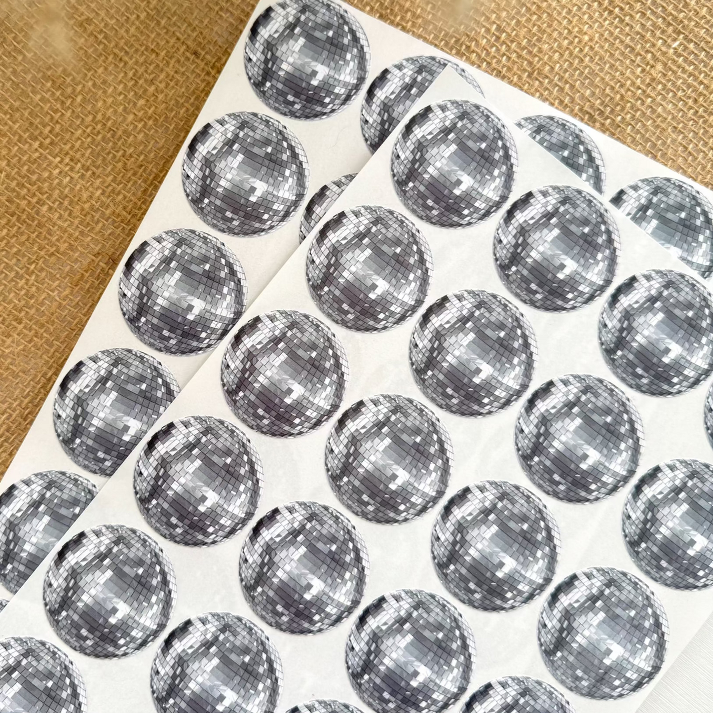 Sheet of round silver disco ball stickers