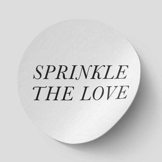 Minimalistic wedding confetti stickers with "Sprinkle The Love" in black text on a white background, available in glossy and matte finish.